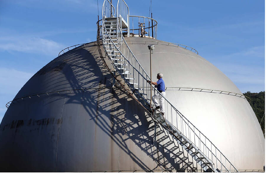 Tim Climbing Methane Tank